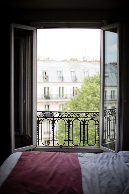 View of Parisian streets and Haussmannian architecture from an apartment window in the Latin Quarter, showing the urban context around Rue Mouffetard